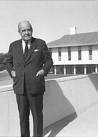 Edward Durell Stone in front of residence hall