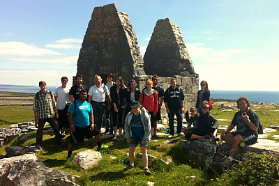 Landmark College students in Ireland stand in front of pyramidal stone monuments