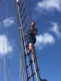 Eric climbing the rigging on the Roseway