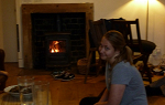 Students in front of the woodstove in Wanlockhead, Scotland