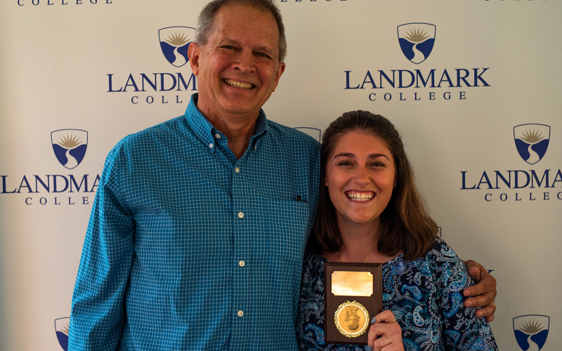Student athlete Lily Reisner, who plays basketball and softball, was honored with the 2018 Coaches Award for Women's Basketball by head coach John Pinkney.