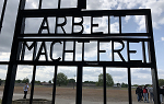 Gate with the German words Arbeit Macht Frei woven into the iron