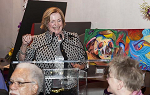 Photo of Nan Strauch at the podium during a Landmark College fundraising gala in 2014.
