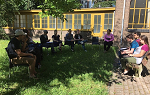 Landmark College students conduct class in an outdoor courtyard during the Summer 2018 study abroad trip to the Netherlands. 