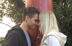 Two students on the Summer 2018 Study Abroad trip to New Zealand demonstrate the hongi, a traditional greeting from the Maori culture where two people press foreheads together and exchange the breath of life. 