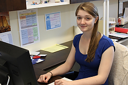 Alicia Keating at computer smiling