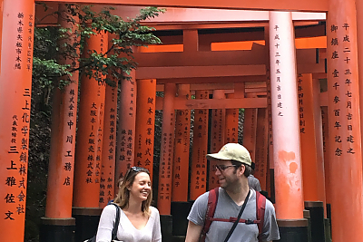 two students walking through the city gates