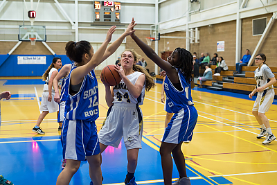 Landmark College women's basketball player makes a basket.