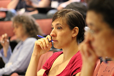Participant listens to presentation at Landmark College
