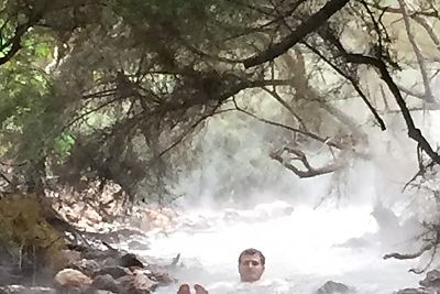 A student enjoys thermal hot springs