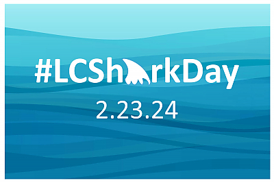 Graphic of blue waves with the words LC Shark Day and date of February 23, 2024. The A in Shark is a dorsal fin.