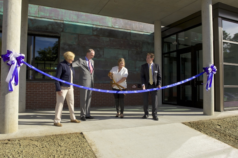 Officials cut the ribbon in front of the new building